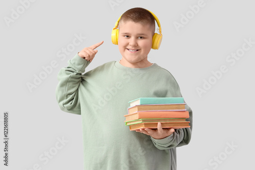Little boy with headphones ...