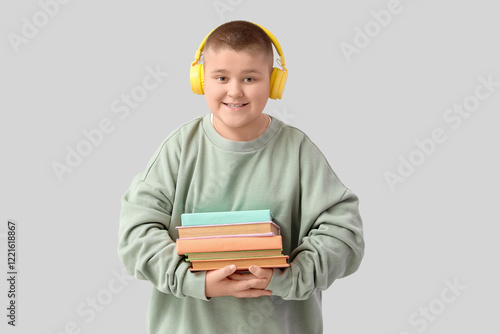 Little boy with headphones ...