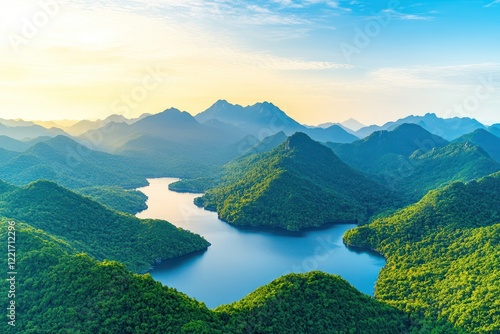 Morning Glow: Aerial View of Green Mountains, Lake, and Forest - Nature's Beauty, Sustainability, and Watershed Concept photo