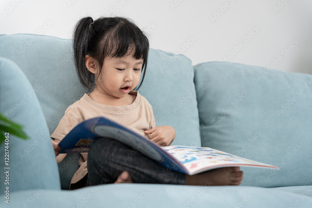 Happy Asian children relax read book at home. daughter and reading a story. learn development, childcare, laughing, education, storytelling, practice, imagine, reduce addiction mobile phone Happy Asian children relax read book at home. daughter and reading a story. learn development, childcare, laughing, education, storytelling, practice, imagine, reduce addiction mobile phone