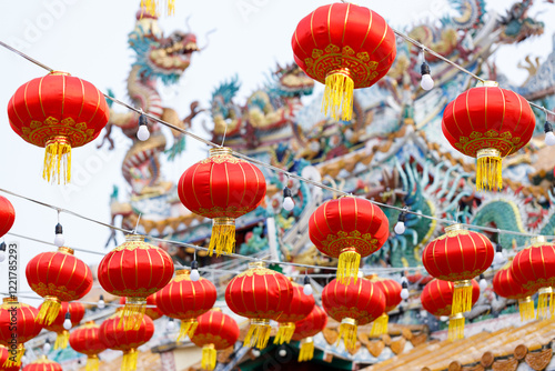 Lunar or Chinese new year lanterns decorated around temple, Thailand.