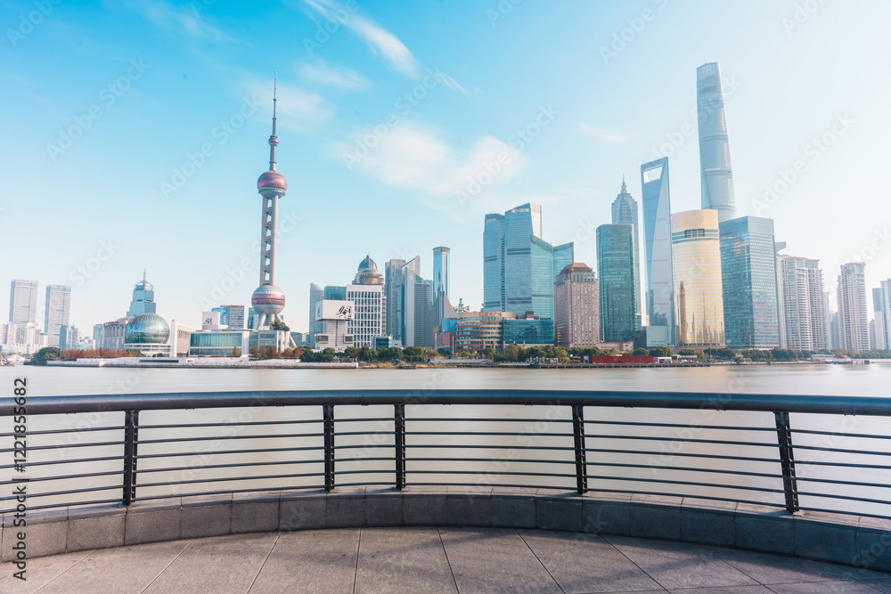 Obraz premium Cityscape view of Shanghai city in the morning. Skyscraper of Lujiazui in Pudong, view from The Bund of Shanghai, China. landmark and popular for tourism attractions. Travel and Vacation concept