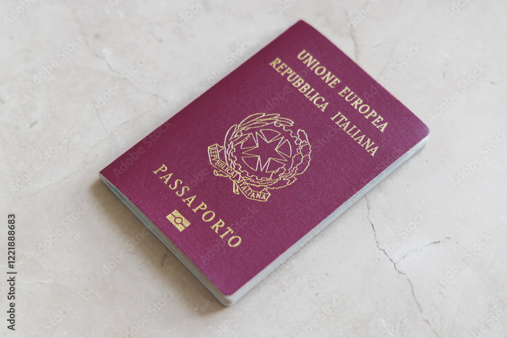 Italian passport with light marble background Italian passport with light marble background