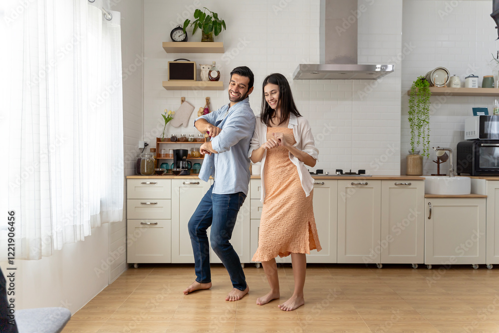 A wonderful scene of love and happiness between a couple in love enjoying their new apartment. A wonderful scene of love and happiness between a couple in love enjoying their new apartment.