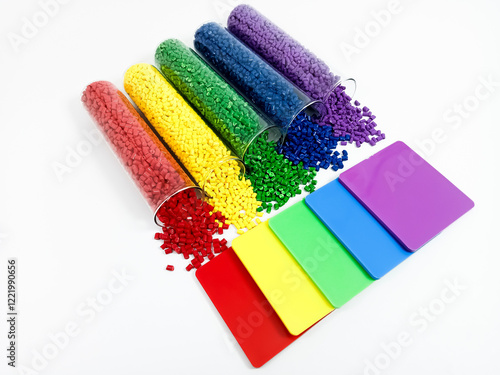 rainbow plastic masterbatch, polymer carrying colorful pigments with glass tube and chips poured in white background, suitable for product catalog design of industrial plastic company profile