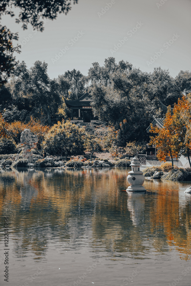 Fototapeta premium Serene Pavilion by Reflective Pond in Tranquil Garden