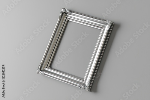 Smooth gray gradient showcasing a slightly angled platinum frame.
