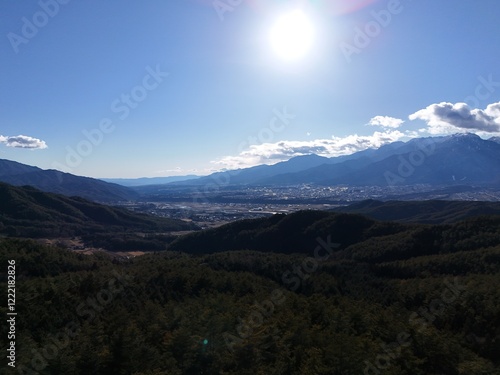 A drone aerial photo of the landscape of the city of Komagane City, Nagano Prefecture. photo