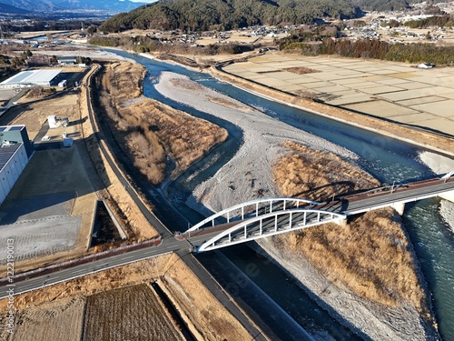 A drone aerial photo of the landscape of the city of Komagane City, Nagano Prefecture. photo