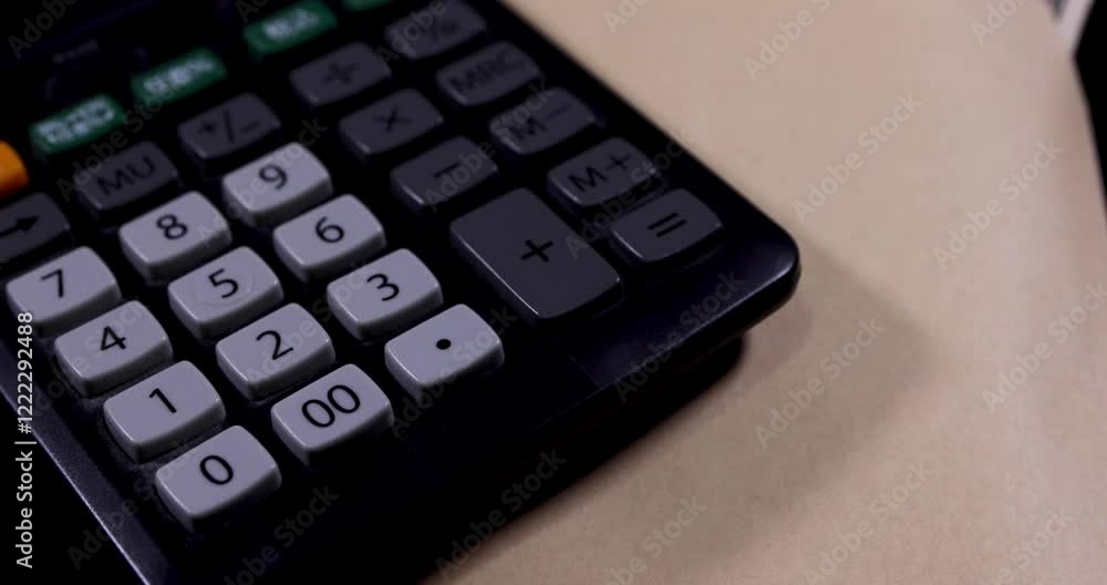 A bundle of bills by Japanese old banknotes with a envelope with calculator tilt A bundle of bills by Japanese old banknotes with a envelope with calculator tilt