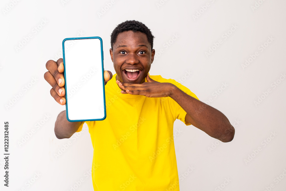 excited young man showing a blank phone screen excited young man showing a blank phone screen