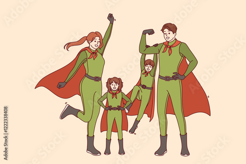 Family of superheroes in green suits with capes demonstrates readiness for heroic deeds and saving world. Men and women, along with small children, dress up in superheroes attire for carnival.