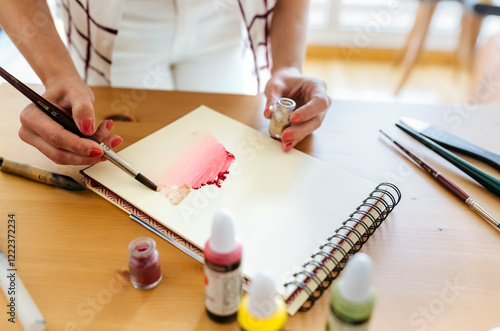 Woman painting, partial view photo