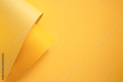 Yellow folded papers as background photo