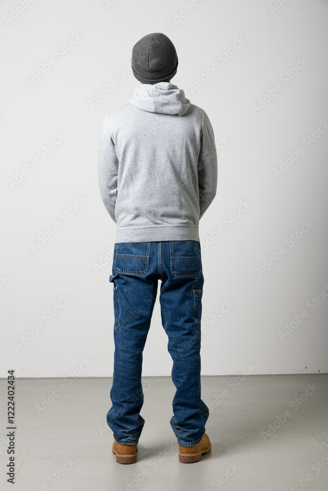 Young adult male in opoiedi seen from behind. Whole body isolated on white background Young adult male in opoiedi seen from behind. Whole body isolated on white background