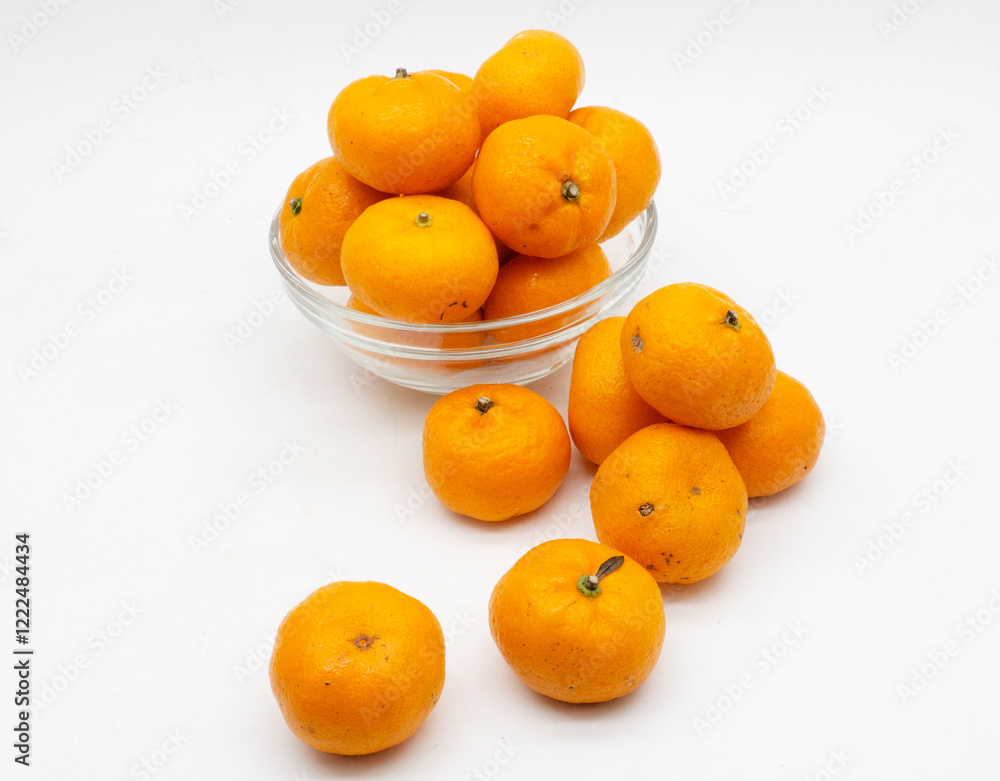 Tangerines. Close view on Fresh Mandarin Orange. Isolated on White Background. Citrus. Sweet. Juicy. Chinese. New Year. Jeruk Keprok Tangerines. Close view on Fresh Mandarin Orange. Isolated on White Background. Citrus. Sweet. Juicy. Chinese. New Year. Jeruk Keprok