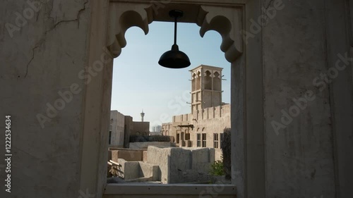 Dubai, United Arab Emirates, 19 January 2024: Al Seef is place for walking, food. historical district with traditional Arabic architecture. old buildings and traditional Arabian street.