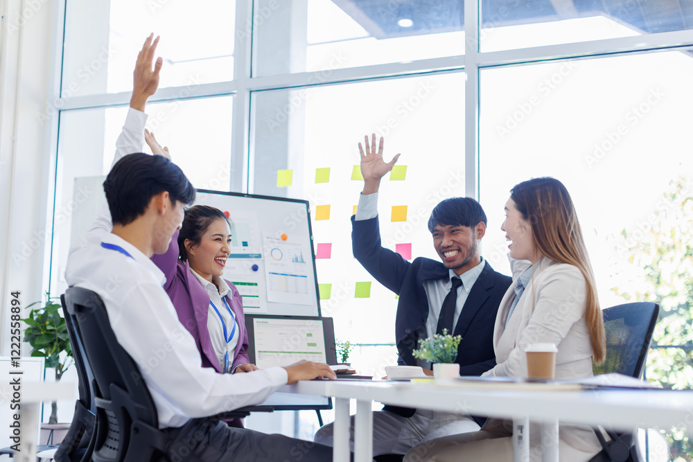 Obraz premium Asian Team work, presentation and meeting with office desk, collaboration and laptop or brainstorming for online project. Employee, working together research on tech for info, coworking and company.