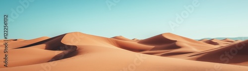 A wide and ethereal desert scene drenched in the mellow light of morning or sunset.