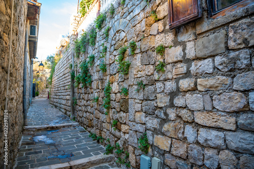 Narrow street in Ulcinj Old Town in Montenegro, the southernmost city at Montenegrin coast, Europe photo