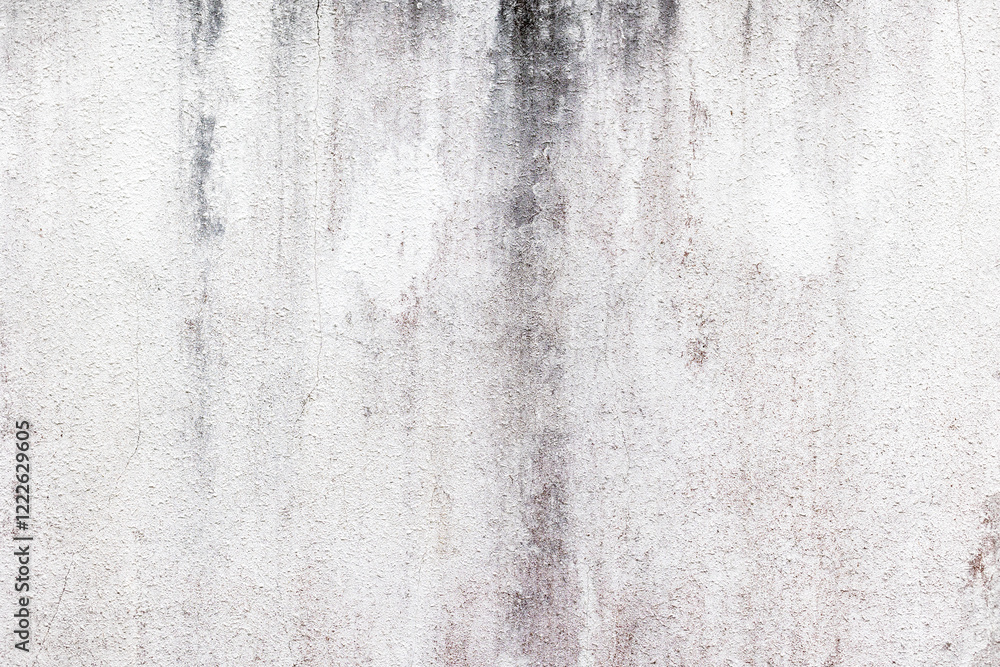 Obraz premium Aged concrete wall with vertical streaks and weathered texture