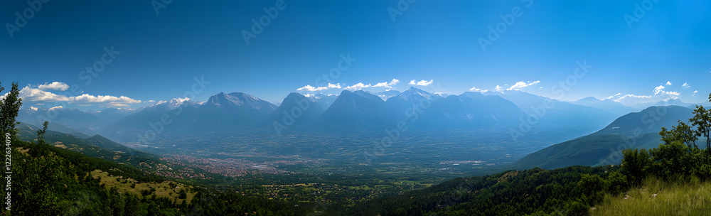 Fototapeta premium Breathtaking Aerial View of Snow-Capped Mountain Range and Green Valleys
