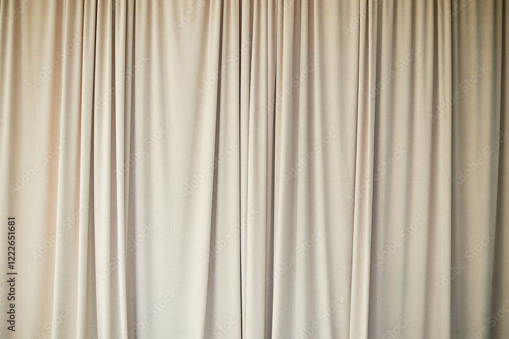 Fototapeta premium Beautiful curtain or curtain drapery. Natural soft light. Sandy, nude, cream color