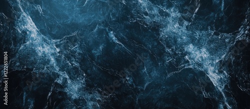 Abstract dark blue background featuring intricate water-like textures with lighter blue highlights creating a sense of depth and movement