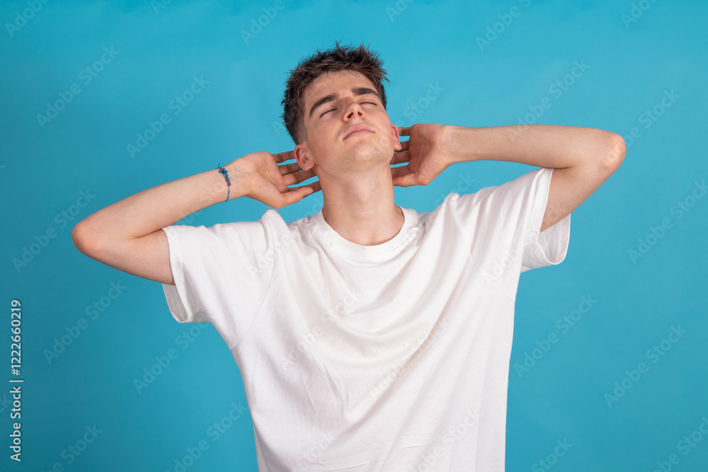 young man isolated relaxed on color background young man isolated relaxed on color background