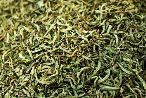 Spice – dried savory, citron (or Armenian herb), jambol, satureja, and peppery herb used for preparing meat dishes. For sale in a bag at the market. photo