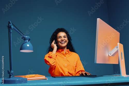 Support agent wearing headset and communicating with customer
