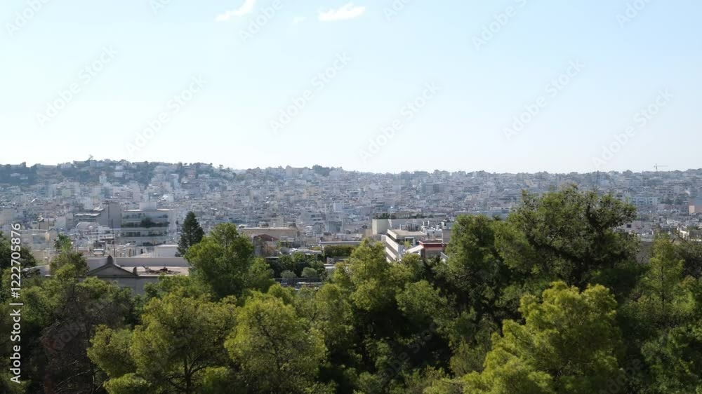 Athens with Acropolis hill on a hot summer day in Greece. Travel image of a heatwave in Athens. Acropolis at sunset, UNESCO World Heritage Site, Athens, Attica, Greece, Europe Athens with Acropolis hill on a hot summer day in Greece. Travel image of a heatwave in Athens. Acropolis at sunset, UNESCO World Heritage Site, Athens, Attica, Greece, Europe