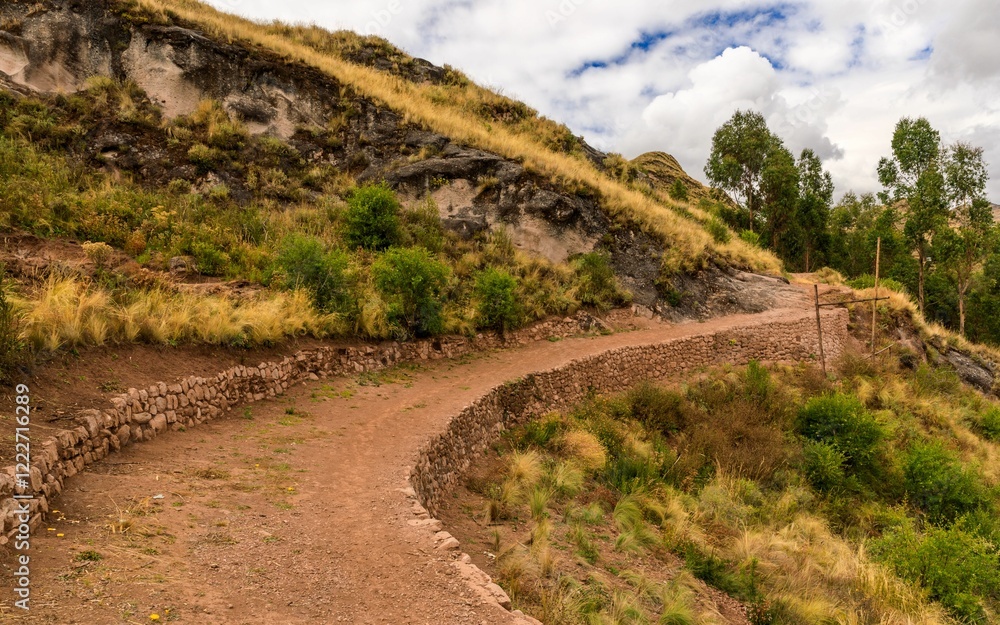 Rustic trail through scenic hillside. Rustic trail through scenic hillside.