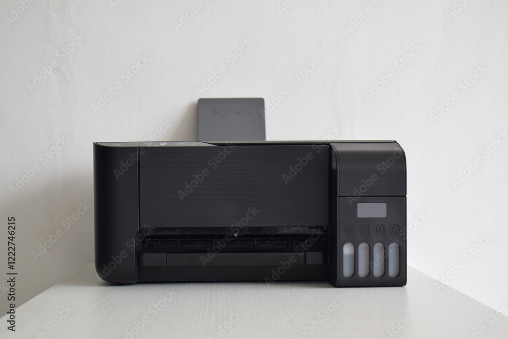 Printer, copier, scanner on white table with white background Printer, copier, scanner on white table with white background