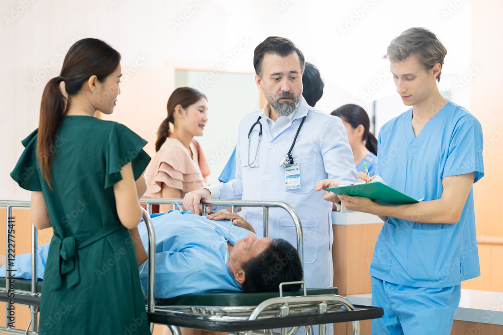 Obraz premium Professional medical team doctor give advice to relative family of senior patient after surgeon from operating room, physician specialties with stethoscope and white coat diagnose heart attack symptom