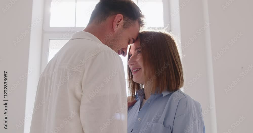 Happy close loving man and woman enjoying tender love moments, expressing unity and care, beautiful positive connection girlfriend and boyfriend, affectionate couple relaxing at home, sun light Happy close loving man and woman enjoying tender love moments, expressing unity and care, beautiful positive connection girlfriend and boyfriend, affectionate couple relaxing at home, sun light