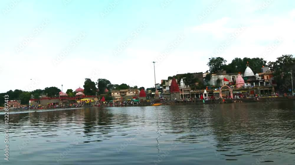 Timelapse of Ram Ghat Ujjain during evening. It is located on the bank of the river Shipra. The evening Kshipra aarti is one of the best attractions at Ram Ghat. Timelapse of Ram Ghat Ujjain during evening. It is located on the bank of the river Shipra. The evening Kshipra aarti is one of the best attractions at Ram Ghat.