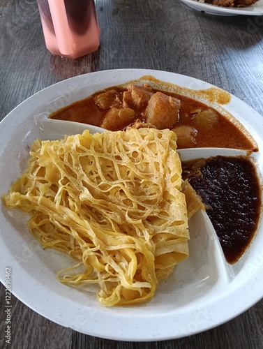 Roti jala is a favorite food in Malaysia originating from Johor, also found in ASEAN countries such as the Malay Peninsula, Riau Islands and Sumatra