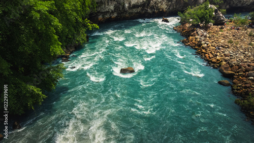 The flow of green river water called Sanghyang Kenit. One of ancient river in west java photo