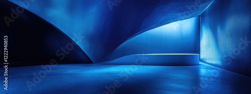 Dramatic blue lighting in an abstract space with empty area for text highlighting creativity and modern design concepts