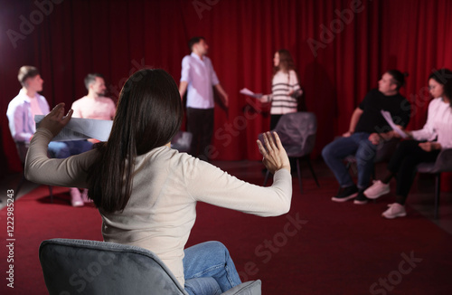 Bild auf Leinwand Professional actors with their scripts rehearsing in theatre