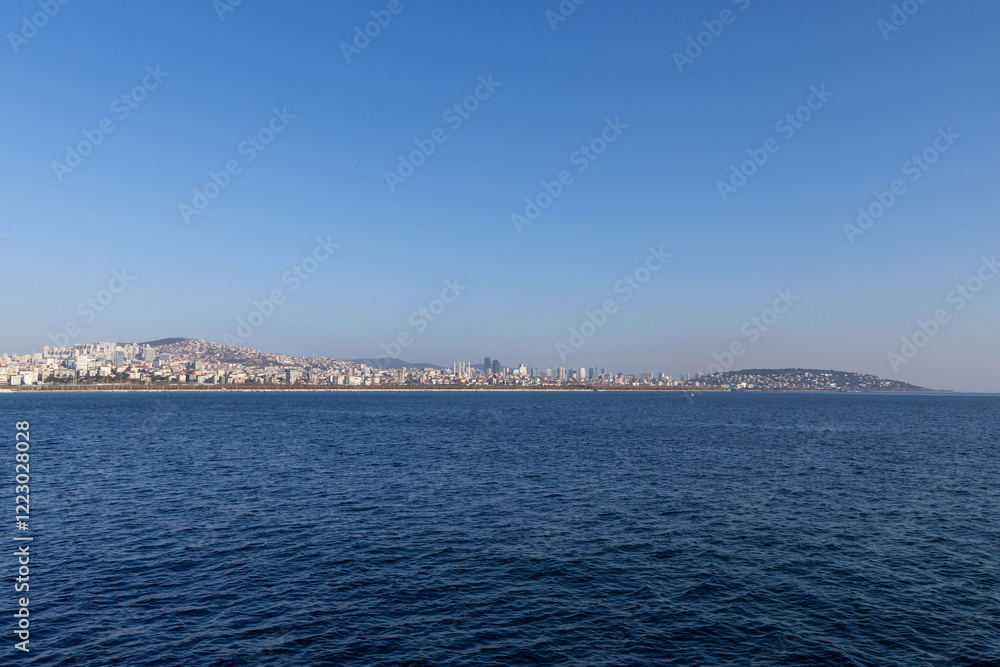 Skyline of Istanbul’s Asian side with modern residential buildings and a rocky shoreline. A vibrant view of the Anatolian side blending urban development and coastal beauty. Panaromic Istanbul 2025 Skyline of Istanbul’s Asian side with modern residential buildings and a rocky shoreline. A vibrant view of the Anatolian side blending urban development and coastal beauty. Panaromic Istanbul 2025