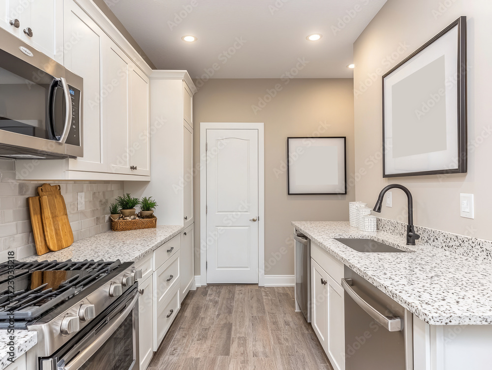 Fototapeta premium Modern kitchen with white cabinets and sleek countertops