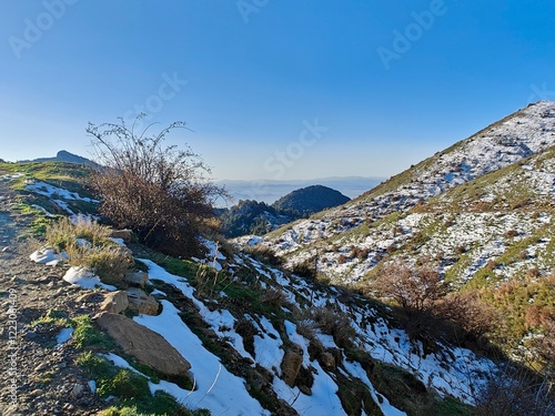 Landscape view from the heights of Djurdjura, tell Atlas with snow-capped mountains. Bouira. Tizi ouzou. Bejaia. Algeria photo