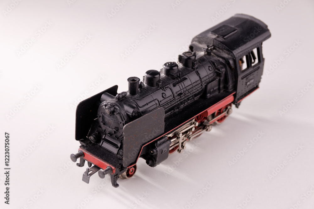 Fototapeta premium View of an old, used, vintage fashion train with white background