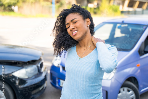 Black woman suffering neck injury after car accident