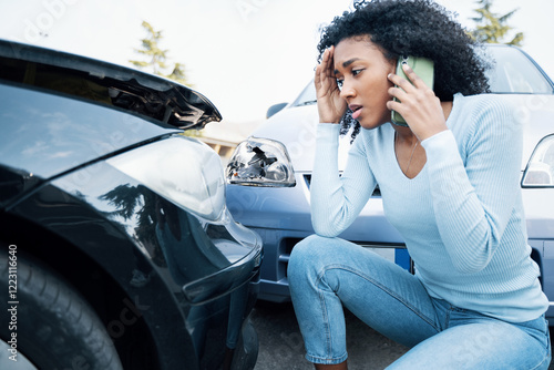 One black woman calling insurance after a crash accident