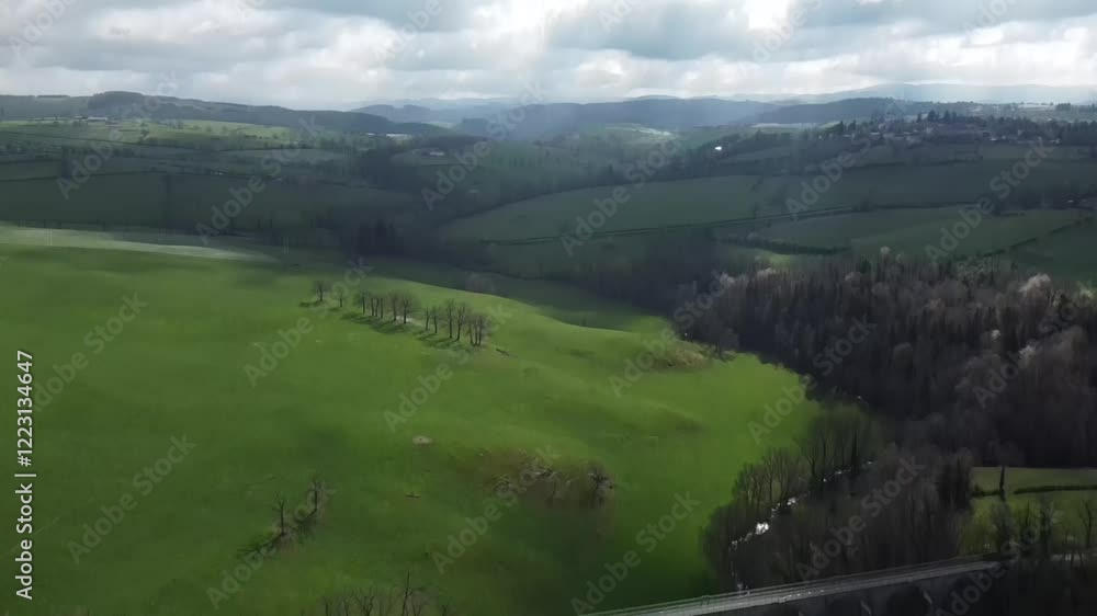 Aerial video over green countryside with streams and bridges in Roanne France Aerial video over green countryside with streams and bridges in Roanne France