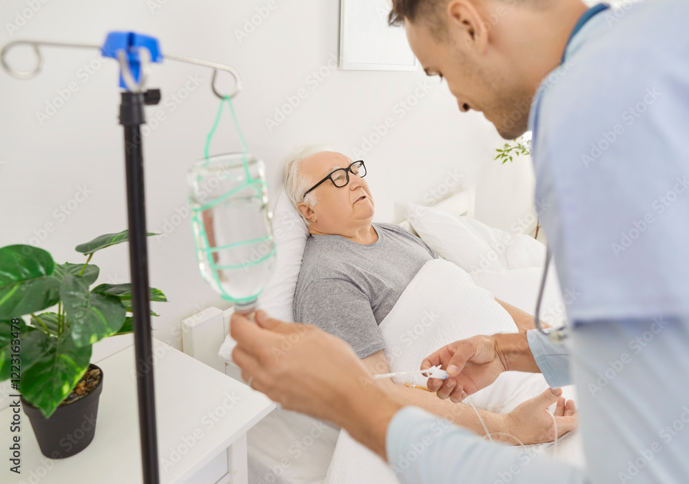 Nursing sick senior man with intravenous drip lying on medical couch at home, clinic with IV drip infusion, hospital therapy to infuse vitamins, drugs to maintain health, chemotherapy cancer treatment Nursing sick senior man with intravenous drip lying on medical couch at home, clinic with IV drip infusion, hospital therapy to infuse vitamins, drugs to maintain health, chemotherapy cancer treatment