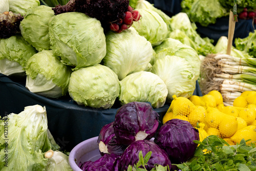 Cabbage, broccoli and other vegetables are on the street market.